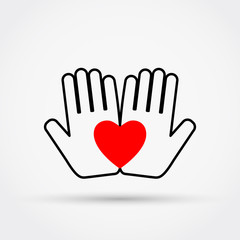 Heart on the palms. Charity symbol. Vector illustration.