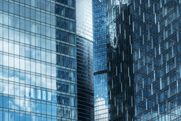 Reflection of a building in the windows of a large business building