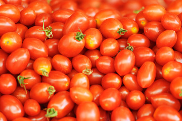 Cherry tomatoes on the counter of the supermarket