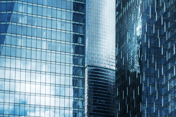 Reflection of a building in the windows of a large business building