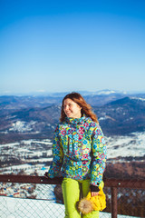 Naklejka premium woman in winter mountains