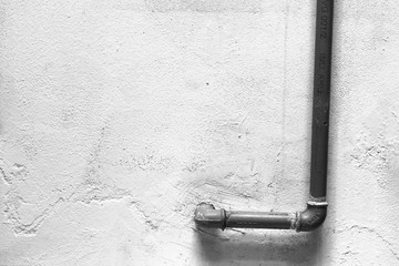 Yellow Plumbing  in a White Wall