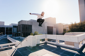 Man doing parkour tricking and freerunning