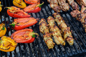 Paprika and meat on a grill