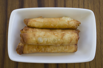 turkish cheese fried dough borek patty with wooden background