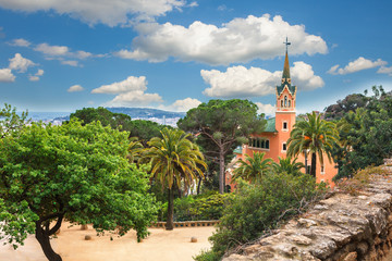 Barcelona, Spain - April 19, 2016: Famous Park Guell in Barcelona, Spain. The Gaudi House Museum. - obrazy, fototapety, plakaty