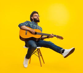 Hipster man with guitar