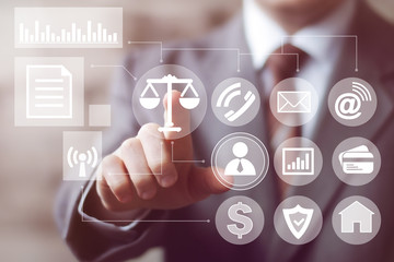 Business button of justice balance scales. Business justice on Internet. The judge is working in the office.