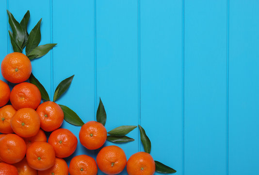 tangerines with green leaves