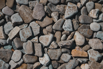 Beautiful flat stones on the seashore. Gorgeous background