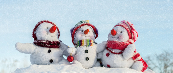 Happy snowman family