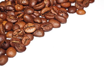 Coffee Grains fried on a white background. Macro