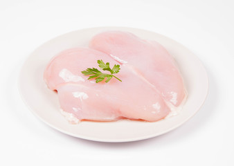  Raw chicken breast on a white background