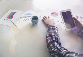 Business team working on laptop, while sitting at office. Business people.