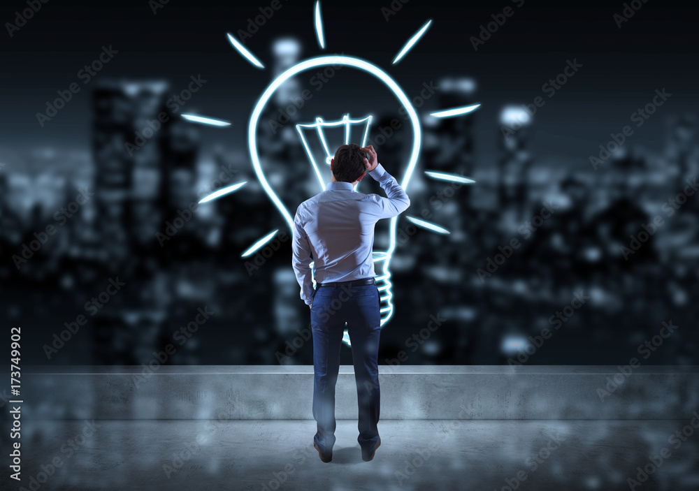 Poster businessman watching hand drawn lightbulb on a rooftop 3d rendering