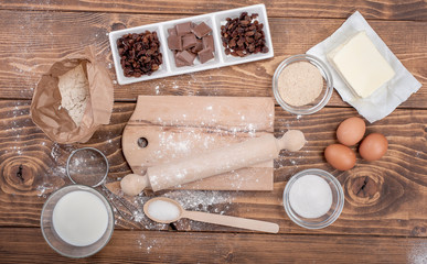 Dough recipe ingredients on vintage rural wood kitchen table