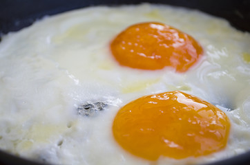 fried eggs in a frying pan food breakfast healthy food