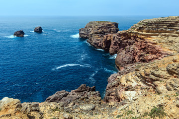 Summer Atlantic rocky coast (Algarve, Portugal).