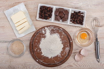 Dough recipe ingredients on vintage rural wood kitchen table