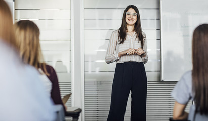 Woman Teacher Making Presentation at School