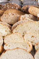 Bakery concept. Plenty of sliced bread background