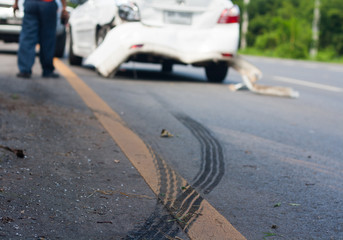 A car accident. Traces of braking tires on the road surface.