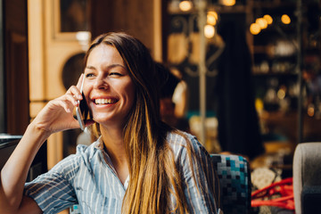 Portrait of young beautiful smiling brunette woman