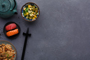 Served table with asian food, top view