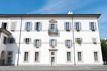 Fototapeta na wymiar White building facade in Gorgonzola, Lombardy, Italy