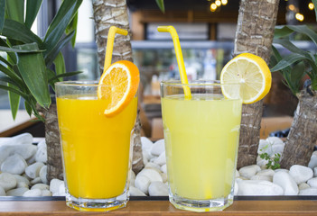 fresh natural lemonade and orange juice close up shoot
