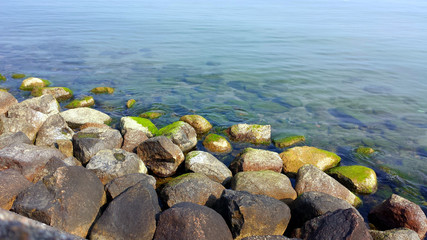Stones on the shores of the calm sea