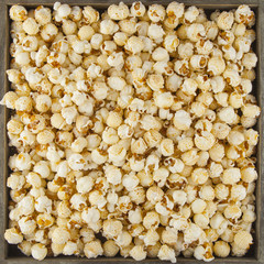 fresh popcorn in full frame can be used as background