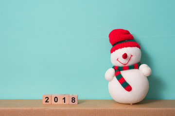 2018 greeting and snowman with green background