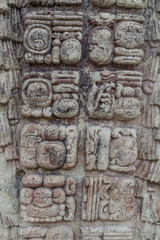 Detail of mayan hieroglyphs at the archaeological site Copan, Honduras
