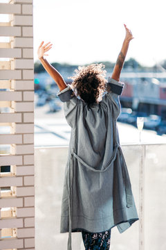 Woman stretching on patio