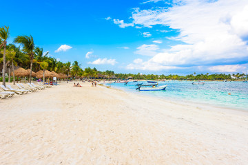 Relaxing on sun lounger at Akumal Beach - Riviera Maya - paradise beaches at Cancun, Quintana Roo, Mexico - Caribbean coast - tropical destination for vacation