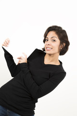 Fototapeta premium Beautiful young woman holding a blank sheet of paper