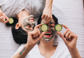 Two friends having fun having beauty treatment