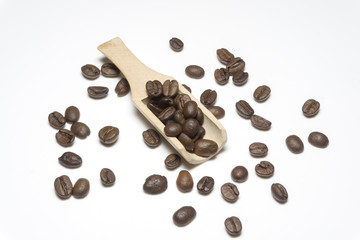 coffee beans and wooden spoon.