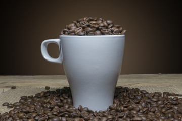 close up coffee beans in a cup