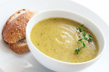 zucchini potato soup puree decorated with thyme
