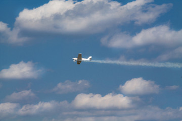 Duster, small old plane for agricultural spraying, flying in the sky
