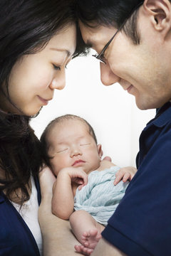 Asian parents love a newborn baby