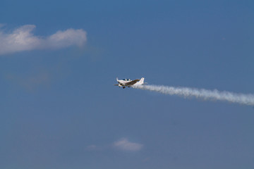 Duster, small old plane for agricultural spraying, flying in the sky