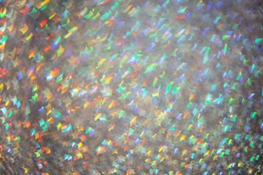 Full frame of colorful star shaped bokeh