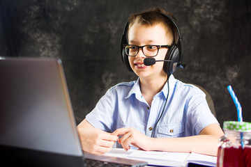 Boy having a video call with headset