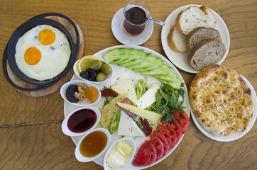 Breakfast plate on wooden table