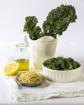 Green kale salad, olive oil, half of lemon and raw millet cereals