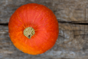 Orange pumpkin on wooden table, Halloween decoration