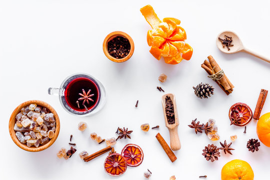 Ingredients mulled wine or grog with spices, citrus for winter evening. Christmas new year eve. White background top view. © 9dreamstudio